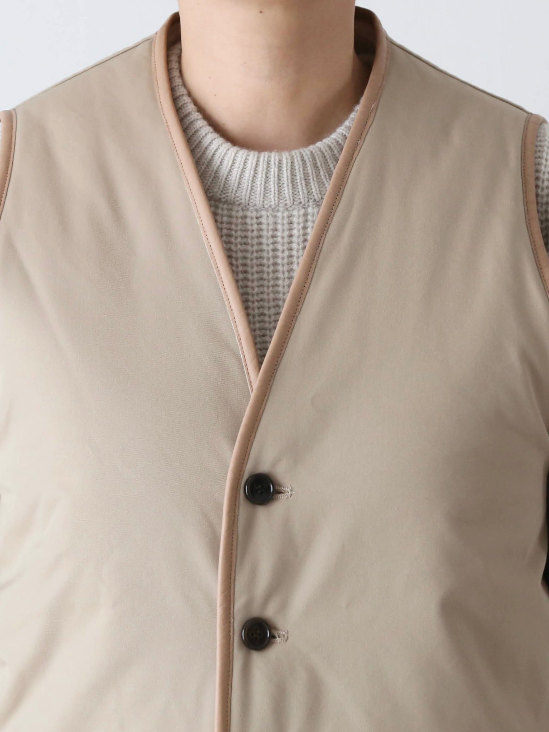 TOUJOURS リバーシブルパデッドライナーロングベスト [YM43NV04]