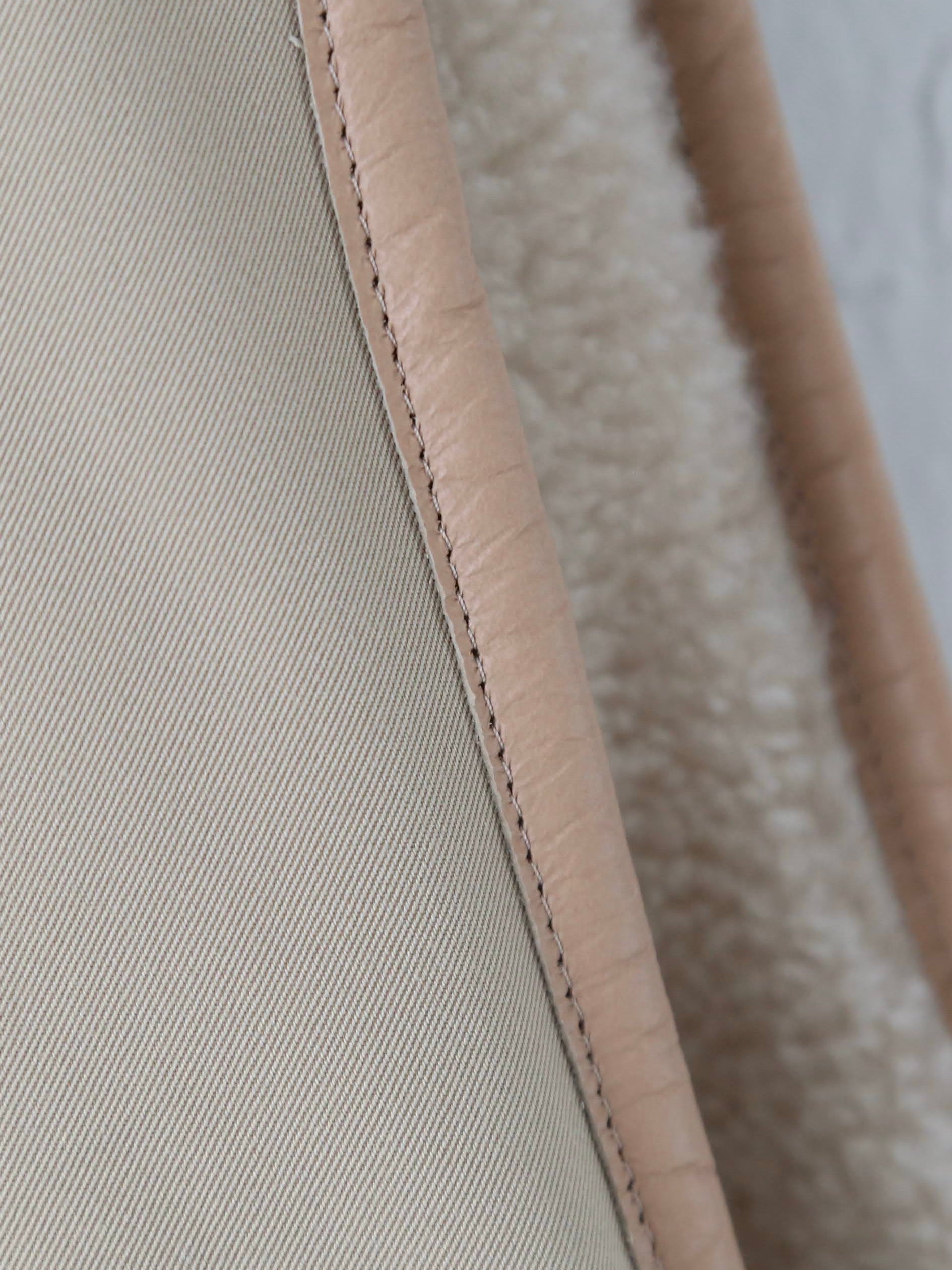 TOUJOURS リバーシブルパデッドライナーロングベスト [YM43NV04]